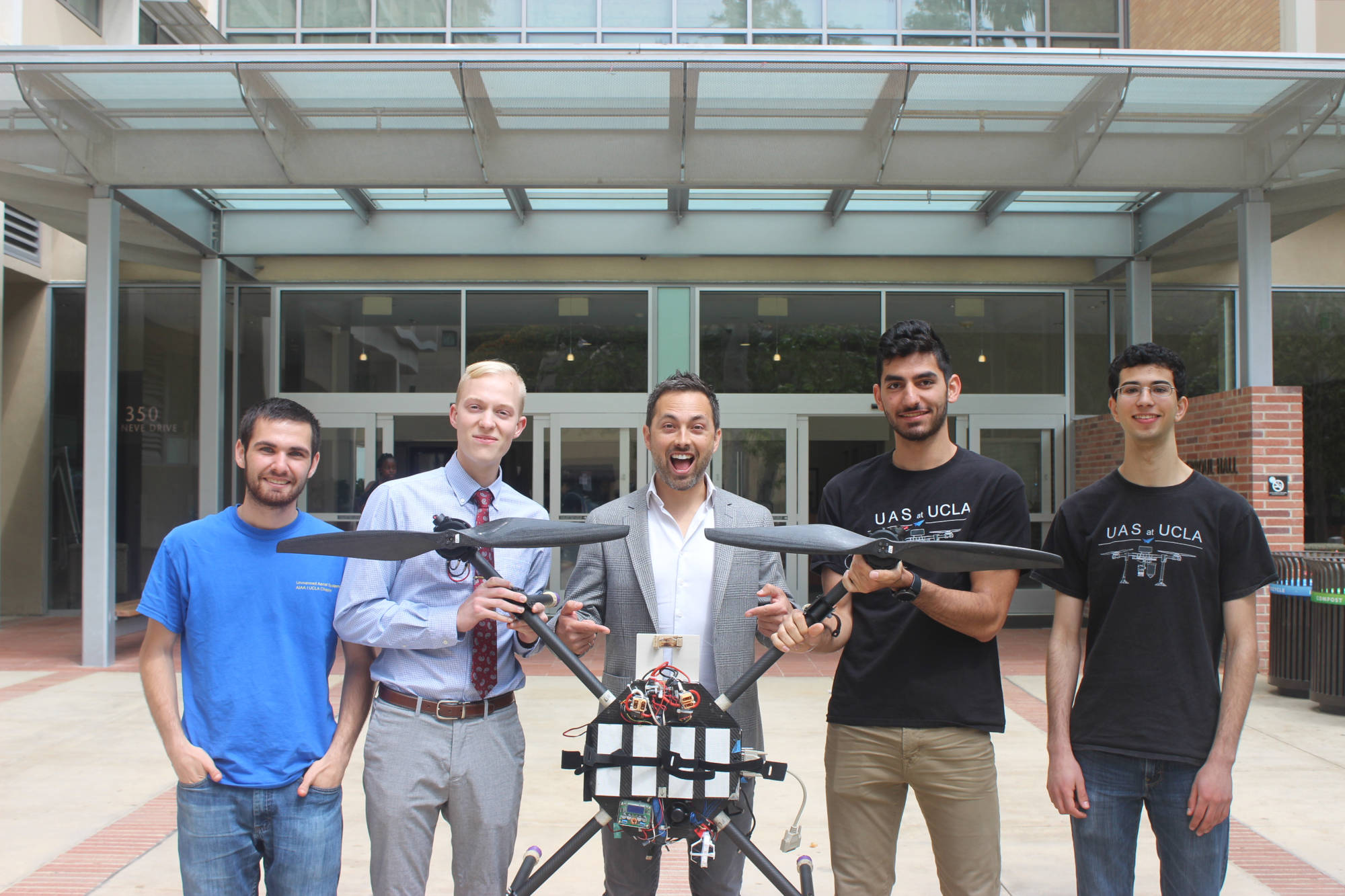 UAS Members holding drone